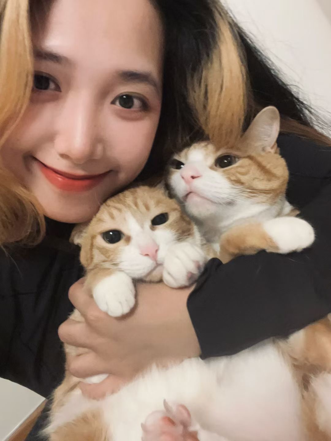 Xiaotong with a pet